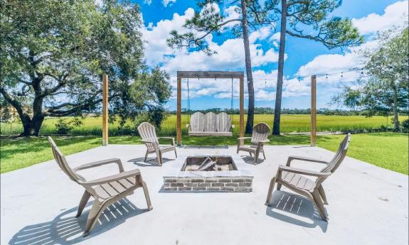 This vacation rental oasis a short drive from St. Augustine has a patio seating area 