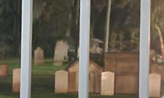 Spirits live at the old cemetery in St. Augustine, seen through the bars of the fence