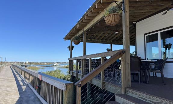 The dock and water at Cat's Paw Marina