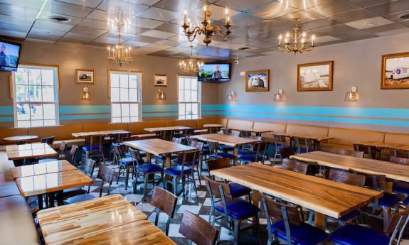 Tables and chairs inside the restaurant