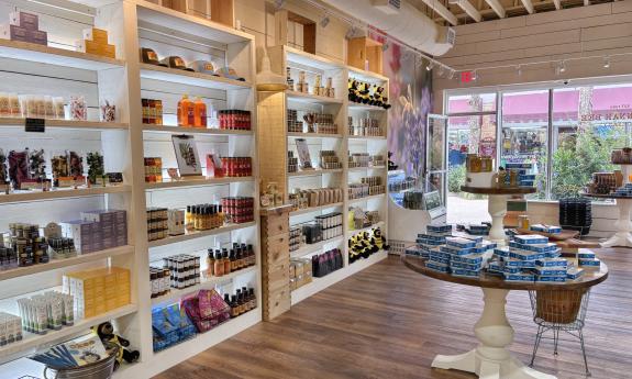 Shelves of various honey products lining the walls
