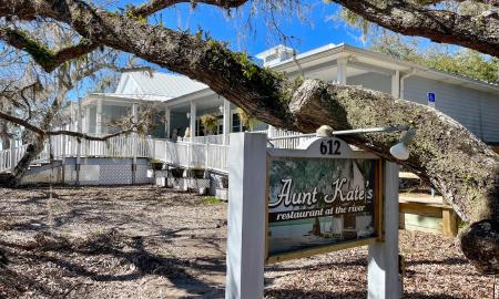 The entrance area to Aunt Kate's restaurant under the oaks