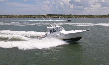 A boat from Drop Down Sport Fish Charters out on the water