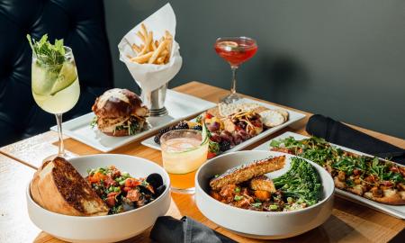 A spread of food and drinks served at Forgotten Tonic