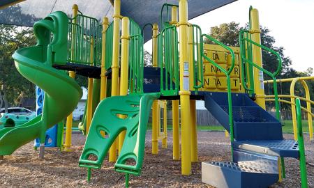 A bright green and yellow playscape