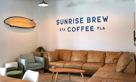 A couch and chair used for the cafe lounge area