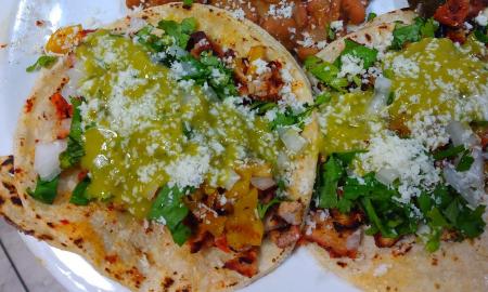 Tacos stuffed with fillings and toppings