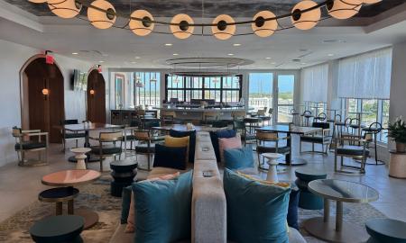 Tables and seats taking up the dining room