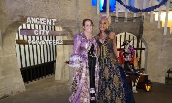 Two pirate ladies in traditional garb at the Blackbeard's Ball