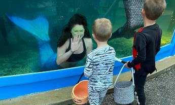 Mermaids and trick-or-treaters at the Under the Sea event