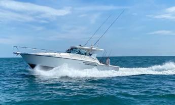 A boat used by In the Box Charters on the open water