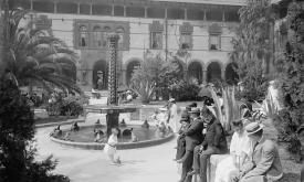 A historic image of guests lounging in Ponce de Leon's courtyard