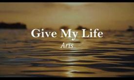 "Give My Life" written and performed by Aris Smith