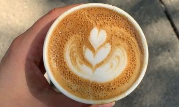 Latte art on a coffee from A Cup of Joy Coffee