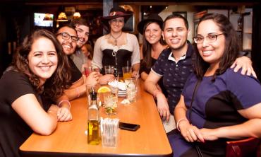 A group sitting at a local hanted bar