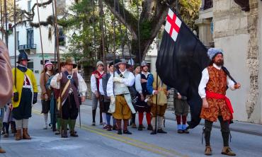 Reenactors marching to commemorate Searle's Sack in St. Augustine.