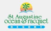 The logo of St. Augustine Ocean & Racquet Resort has bright green and blue lettering and a sunrise over the dunes