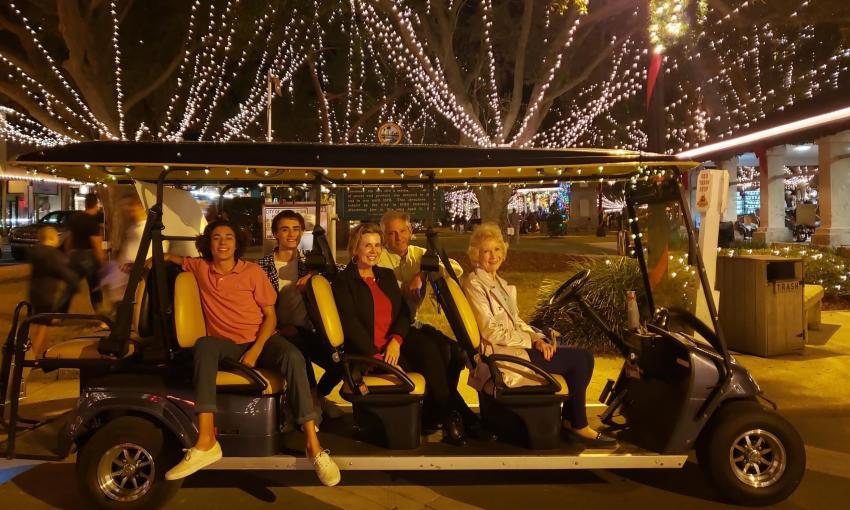 A family aboard the Gold Tours Nights of Lights tour in St. Augustine